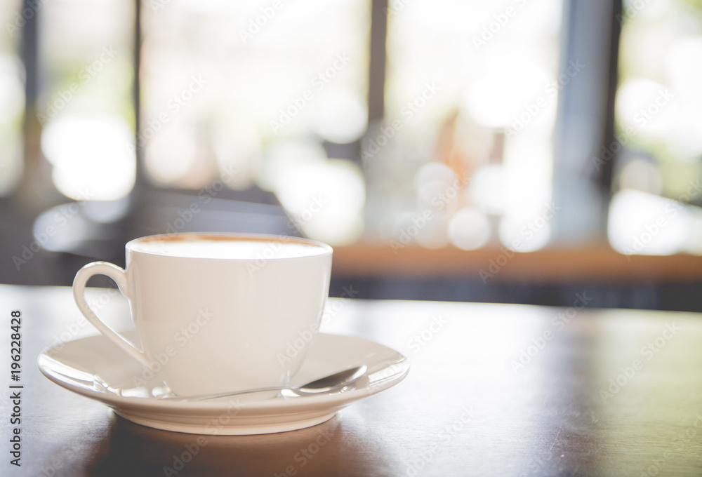 cup of coffee on table in cafe cup of coffee on table in cafe