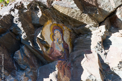 rock painting of virgin mary and jesus near osgovo monastery, former yugoslavian republic of macedonia photo