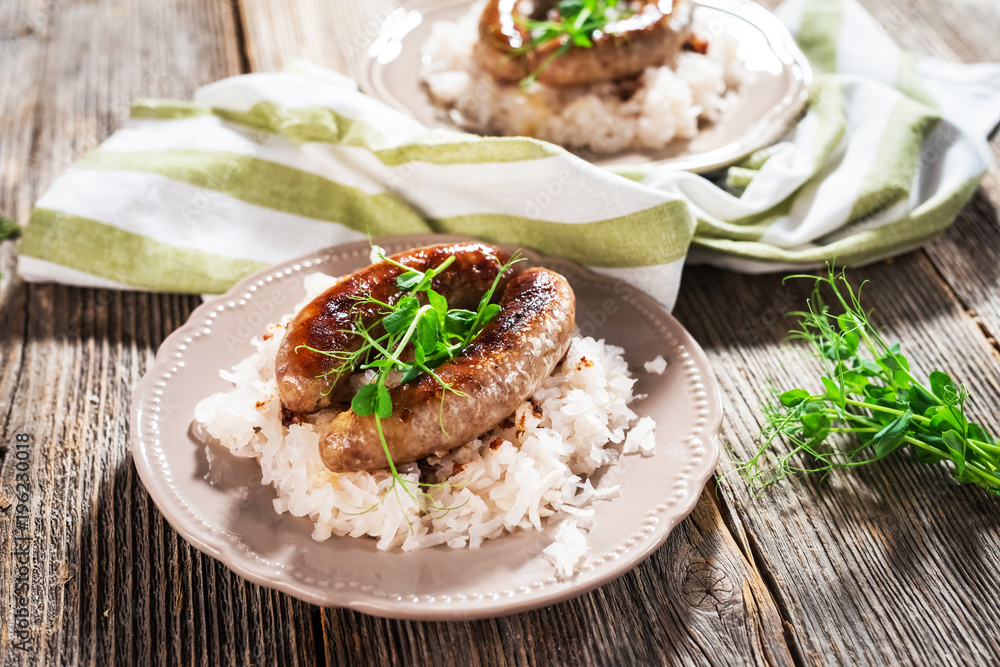 Sausage and sour turnips on rustic background Sausage and sour turnips on rustic background