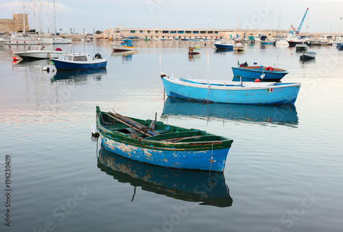 Colorful boats in the evening time. © Yevgen Belich