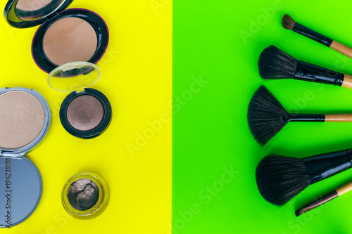 set of professional decorative cosmetics, makeup tools and accessory on colorful background. beauty and fashion concept. photo