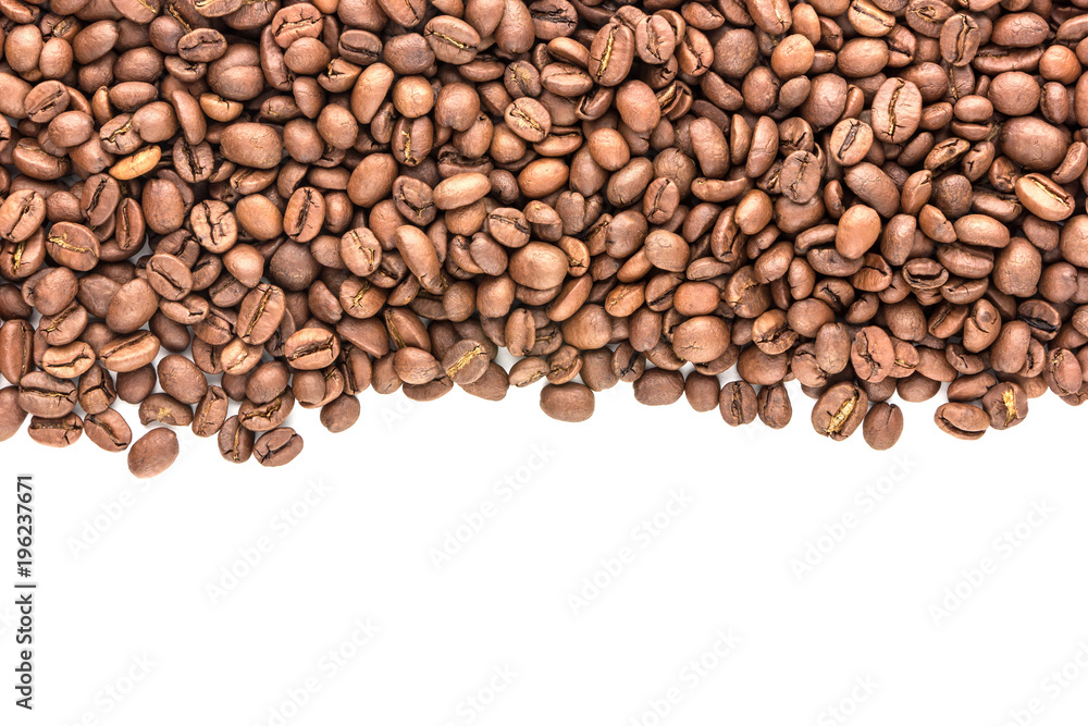 Grains of coffee scattered on the top of the photo. Roasted coffee beans close-up. Grains of coffee scattered on the top of the photo. Roasted coffee beans close-up.