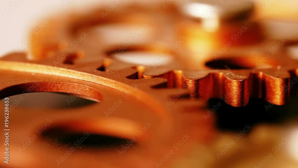 clock 's mechanism- wheels spinning -close up clock 's mechanism- wheels spinning -close up
