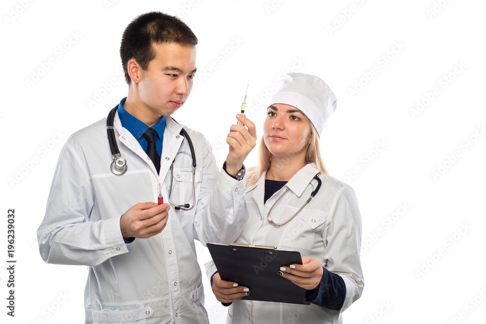Studio portrait of young doctors in uniform Studio portrait of young doctors in uniform