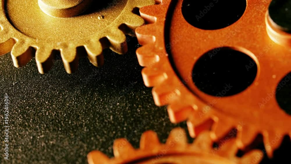 clock wheels mechanism: wheels beating time- macro clock wheels mechanism: wheels beating time- macro