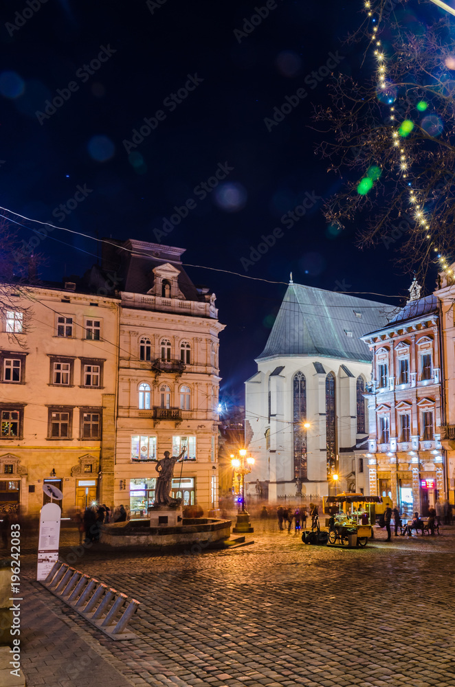 Naklejka premium Scenic night Lviv cityscape architecture on the long exposure
