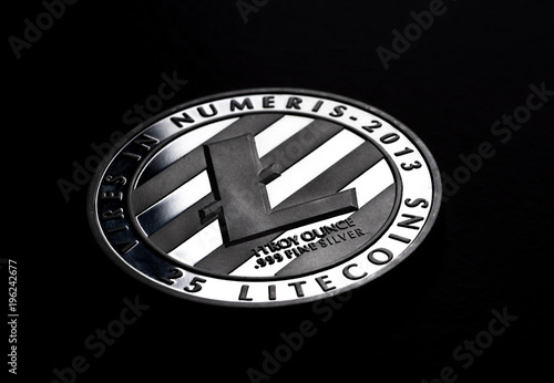 Free Download Silver Litecoin on dark background. Close up (Macro) - GFXLoad