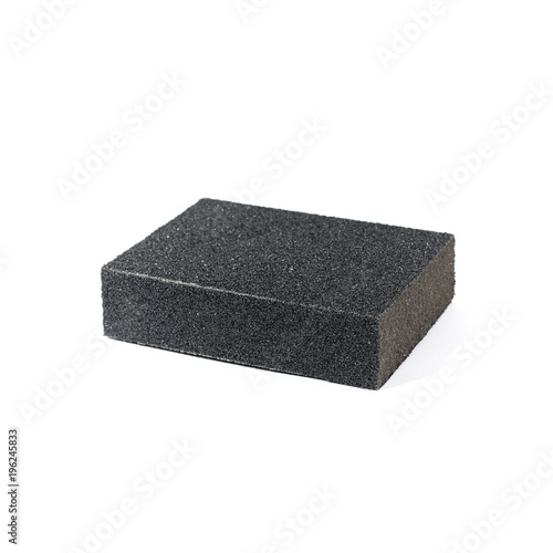Black sandpaper block isolated on white background