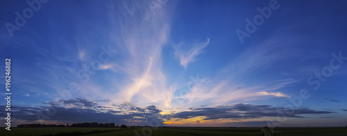 Panorama sunset on big blue sky