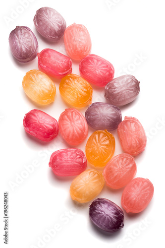 Hard candies over white background