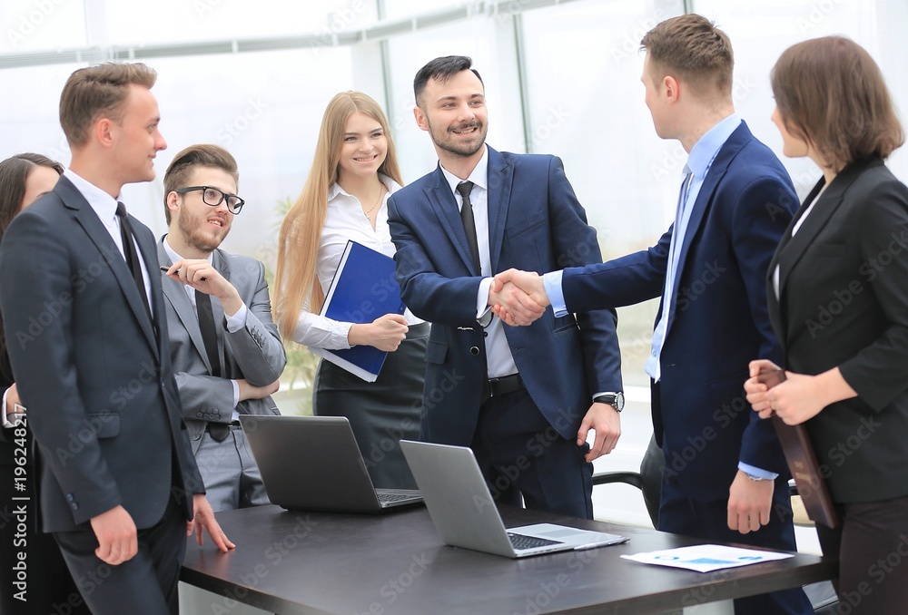 representatives of the two business teams greet each other representatives of the two business teams greet each other