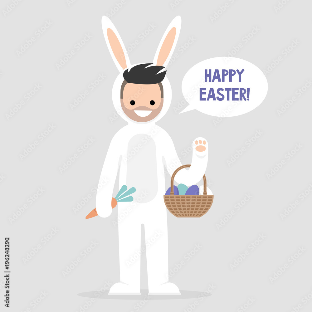 Fototapeta premium Happy easter. Young male character wearing a white bunny costume and holding a basket with dyed eggs. Holidays. Flat editable vector illustration, clip art. Culture and celebrations.