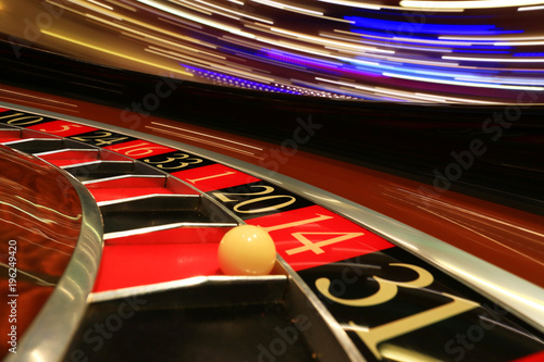 Classic casino roulette wheel with ball