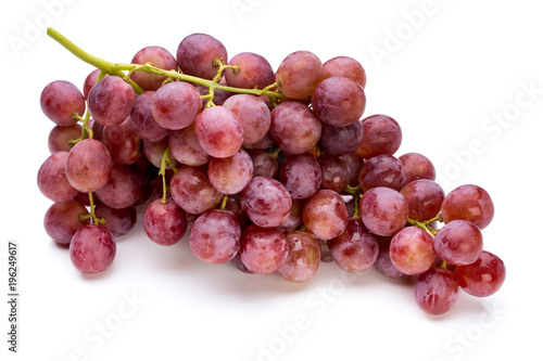 Ripe red grape isolated on white.