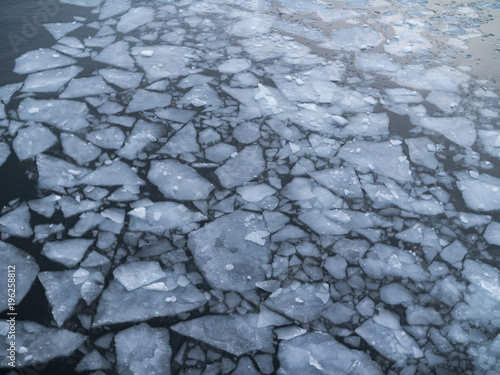 Cracked Ice floes drifting through the Copenhagen canal, as they slowly melt