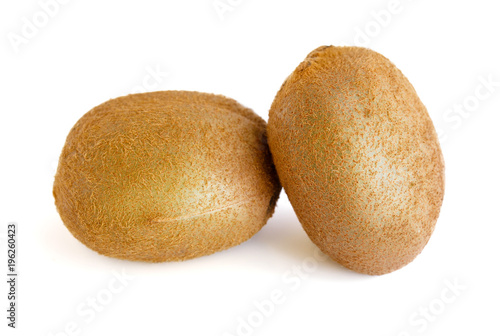 Two whole kiwi fruit isolated on a white background