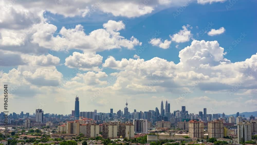 Time lapse of moving clouds over downtown Kuala Lumpur, Malaysia Time lapse of moving clouds over downtown Kuala Lumpur, Malaysia
