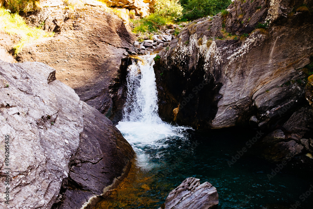 Waterfall in the mountains, Alpe Devero, Piedmont, Italy Waterfall in the mountains, Alpe Devero, Piedmont, Italy