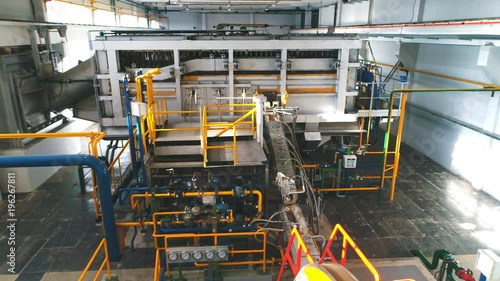 Industrial Factory. Various mechanisms and metal pipes