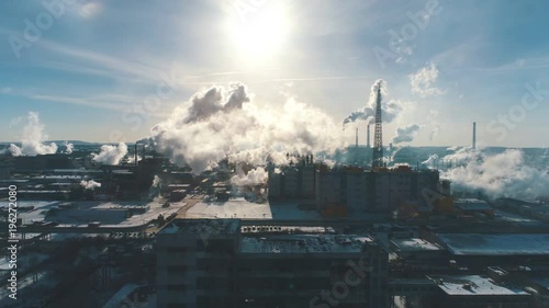 Chemical plant for the processing of chipboard and smokestack of a furniture factory