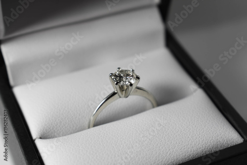 Black and white close up of a diamond engagement ring