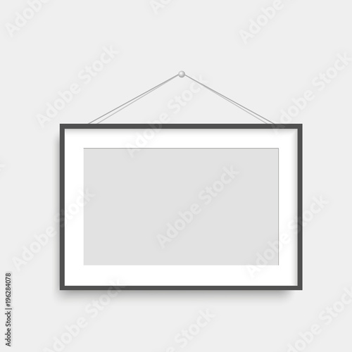 Realistic black photo frame hanging. Vector.