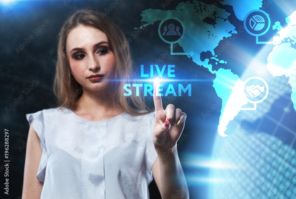 The concept of business, technology, the Internet and the network. A young entrepreneur working on a virtual screen of the future and sees the inscription: Live stream