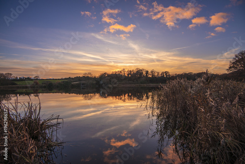 A beautiful sunset on Pebsham Lake  near Bexhill  East Sussex  England