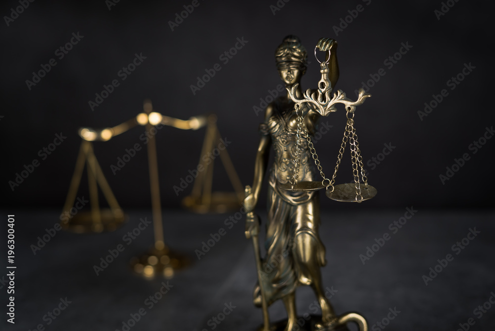 Law and Justice concept. Mallet of the judge, books, scales of justice. Gray stone background, reflections on the floor, place for typography. Courtroom theme. Law and Justice concept. Mallet of the judge, books, scales of justice. Gray stone background, reflections on the floor, place for typography. Courtroom theme.