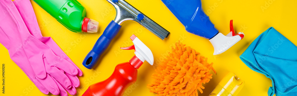Cleaning concept - cleaning supplies on wood background - obrazy, fototapety, plakaty 