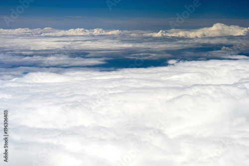 The top view on clouds from an airplane window © Roman