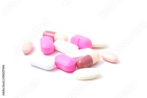 Colorful medications pills isolated on white background