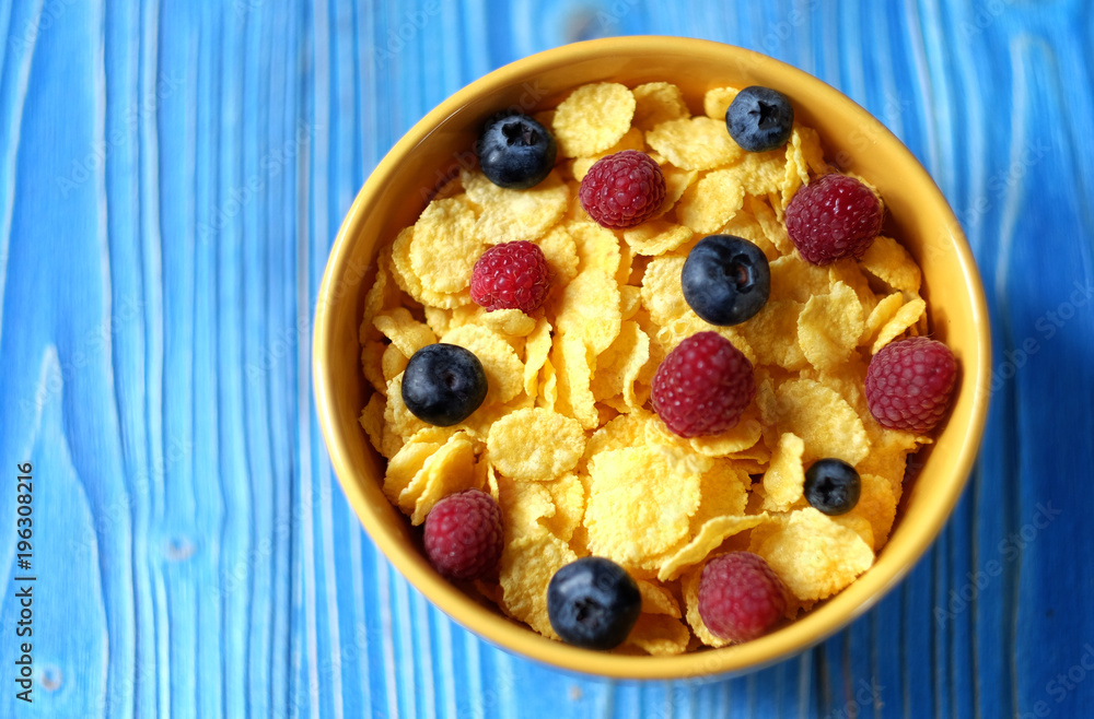 Cornflakes and different Berries - Blueberries and fresh Raspber Cornflakes and different Berries - Blueberries and fresh Raspber