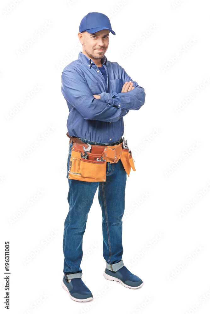 Plumber with tool belt on white background Plumber with tool belt on white background