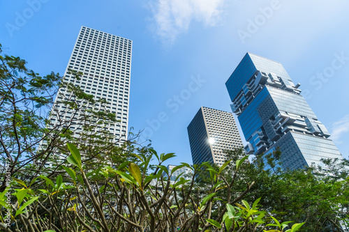 Modern office building against blue sky.