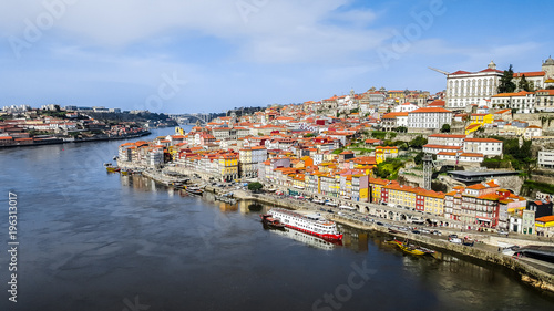 Panoramic view of downtown of Porto, Portugal with Dom Luis I Bridge over Douro River. © sforzza