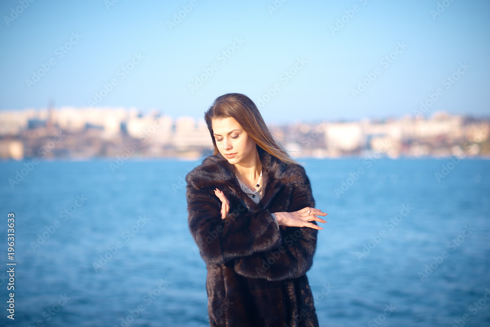 Young pretty blonde walking outdoors