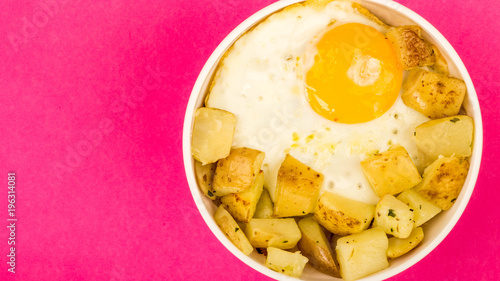Fried Egg With Fried Potatoes In A Bowl