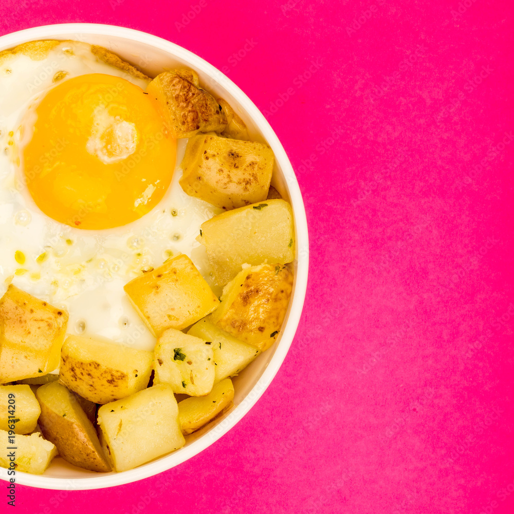 Fried Egg With Fried Potatoes In A Bowl Fried Egg With Fried Potatoes In A Bowl