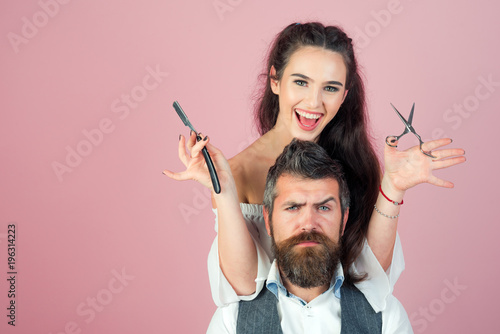 Handsome man hairdresser, beautiful girl