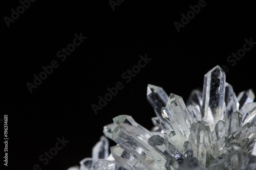 Big natural double quartz crystal isolated on white.