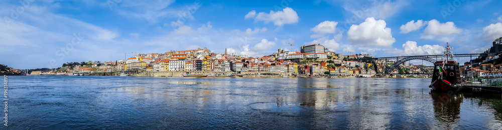 Panoramic view of downtown of Porto, Portugal with Dom Luis I Bridge over Douro River.
