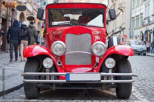 Front view of the vintage car red. © Maksim