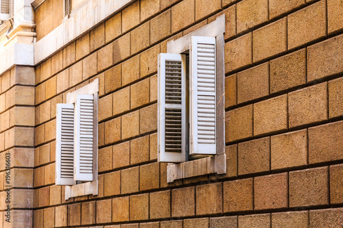 White Shutters on Old Stone Building