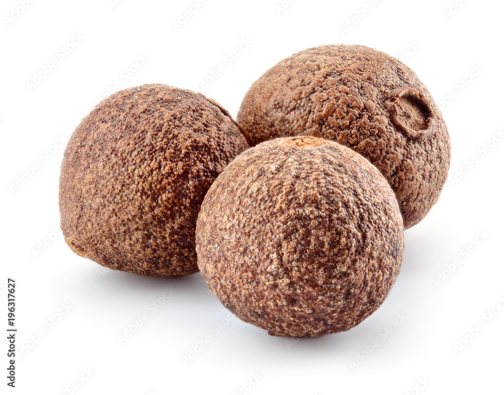 Allspice pepper isolated on white. Three peppercorns. Macro. Full depth of field. Allspice pepper isolated on white. Three peppercorns. Macro. Full depth of field.