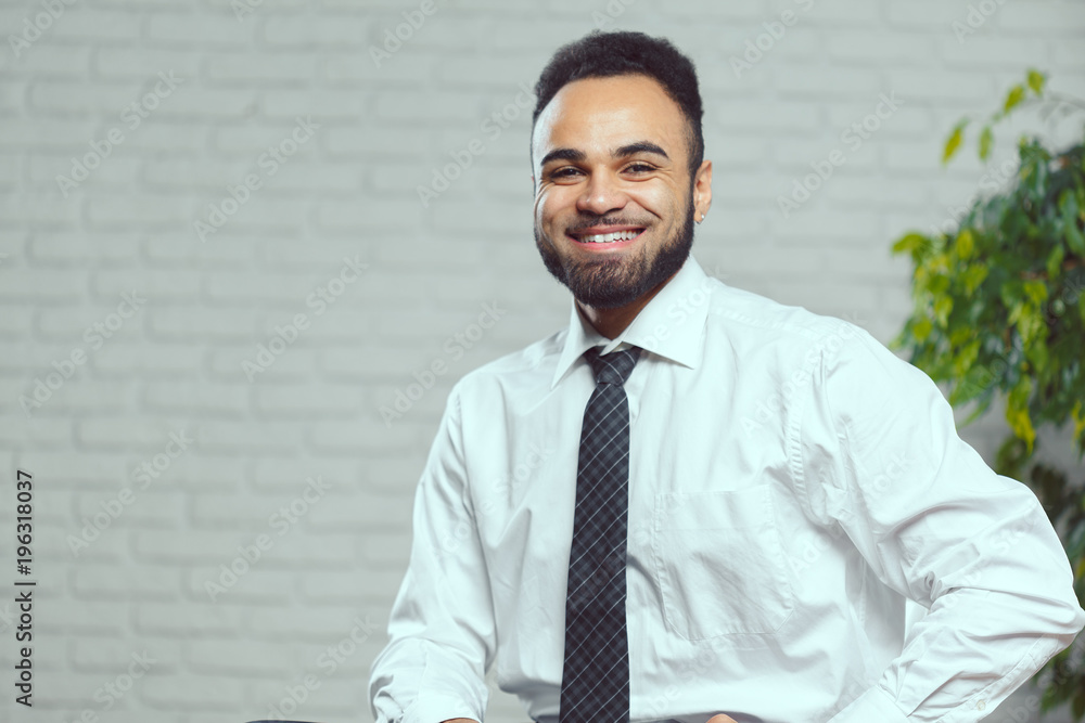 Handsome cheerful african american executive business man Handsome cheerful african american executive business man