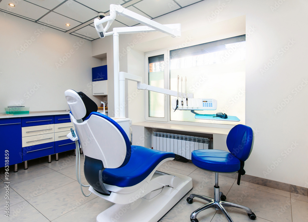 Interior of new modern dental clinic office room with chair in blue and  white colors. Dentistry, stomatology, medicine medical equipment concept in  teeth cabinet Stock Photo | Adobe Stock