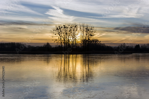 Sunset over a frozen lake