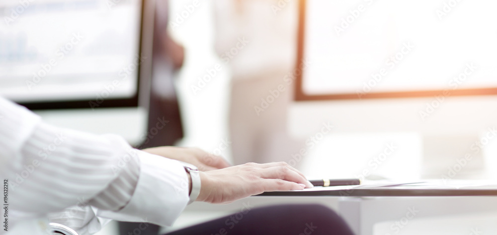 Fototapeta premium close-up of a work desk in a modern office. business concept.