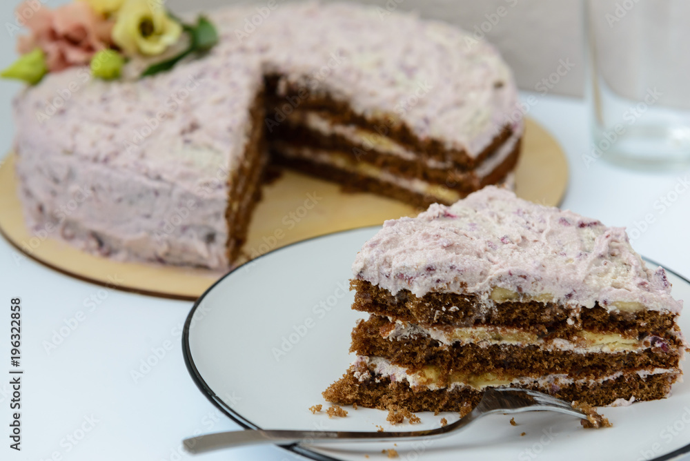 homemade cake with cream and fresh flowers homemade cake with cream and fresh flowers